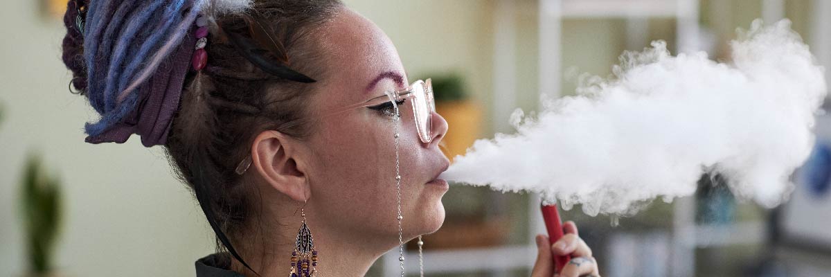 Woman vaporizing drugs